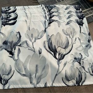 8 Flowered Placemats. Never used. Blues/greys/white.